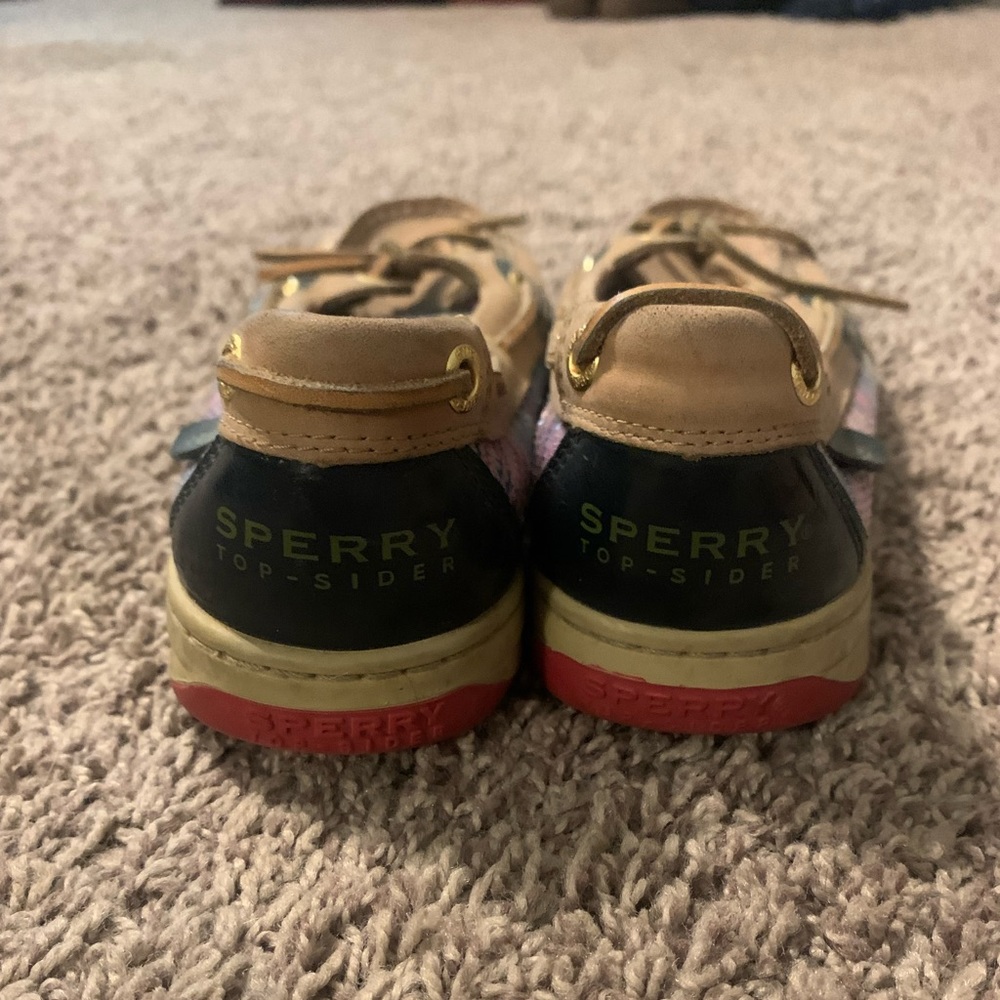 Sperry slip on shoes.